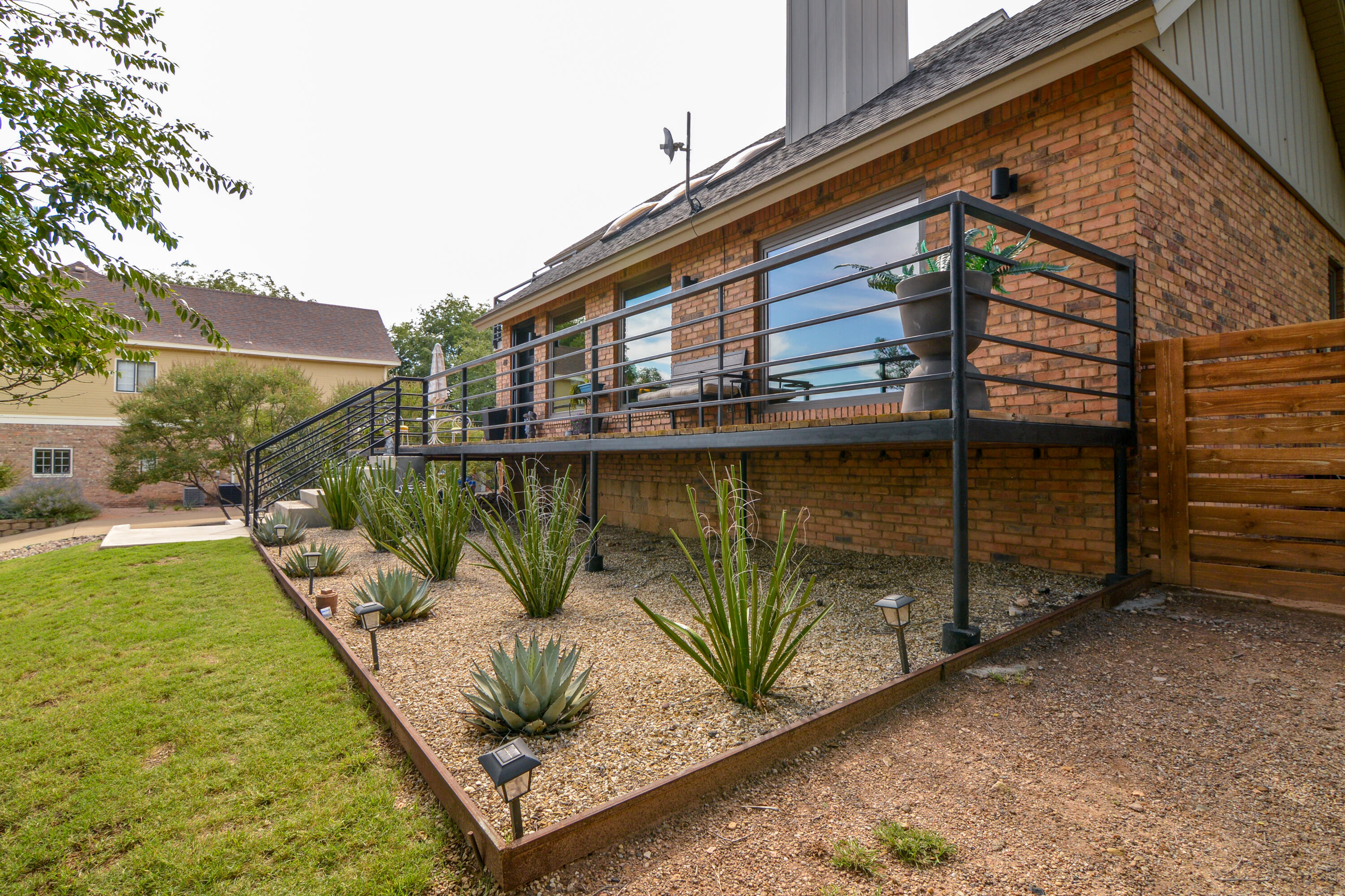 69 South Lake Shore Drive Ransom Canyon, TX 79366 - Photo 49 of 49 a view of a house with a yard
