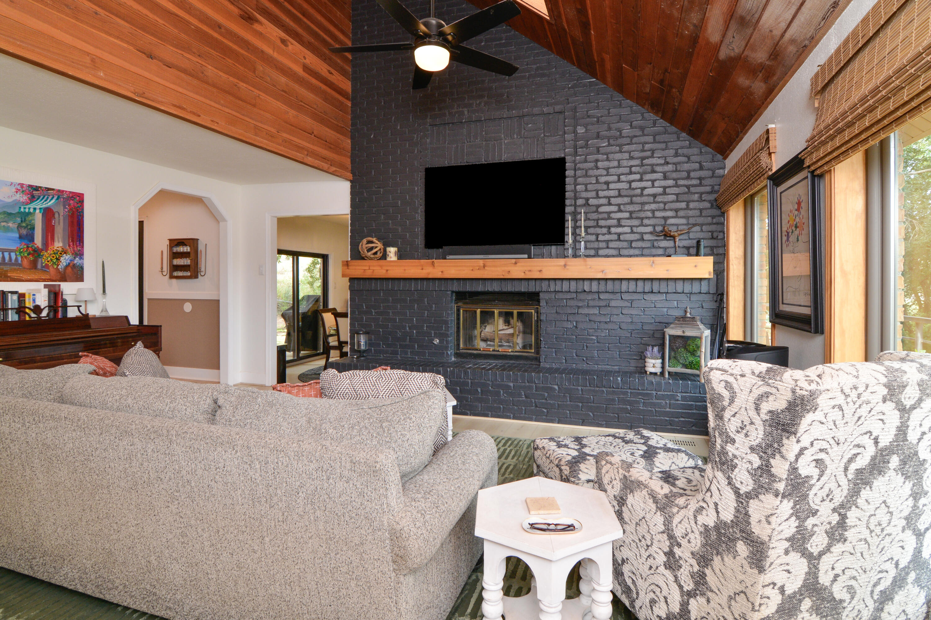69 South Lake Shore Drive Ransom Canyon, TX 79366 - Photo 9 of 49 a living room with furniture and a flat screen tv
