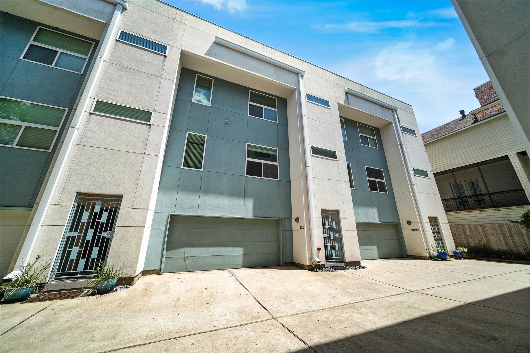 a front view of a house with a garage