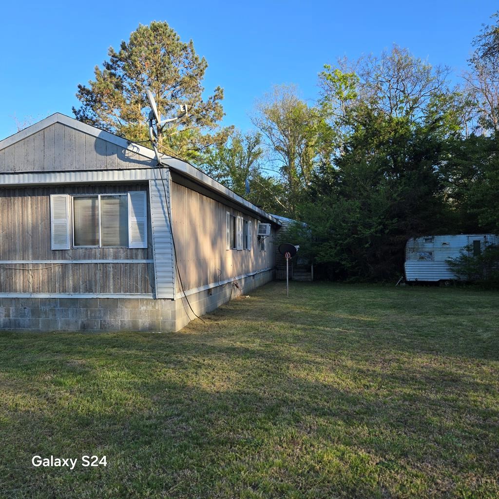 27282 Cheapside Road Cape Charles, VA 23310 - Photo 13 of 16 a house view with a garden space