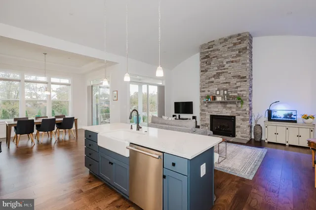 a view of a dining room with furniture and window