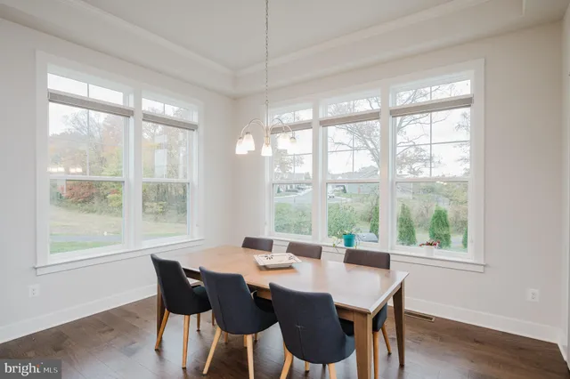 a bedroom with bed and window