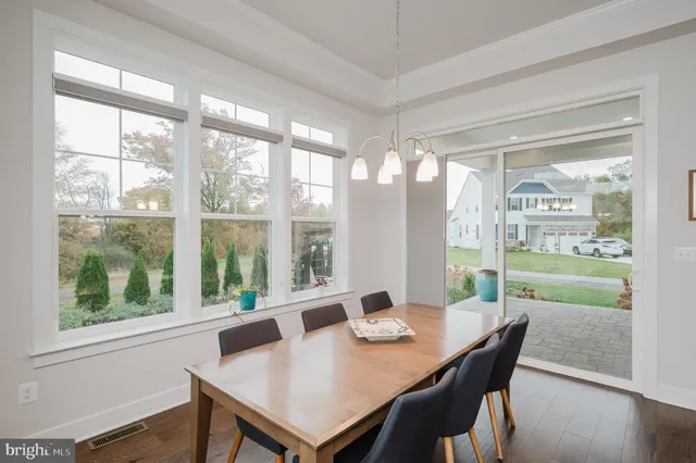 a spacious bedroom with a bed and a couch