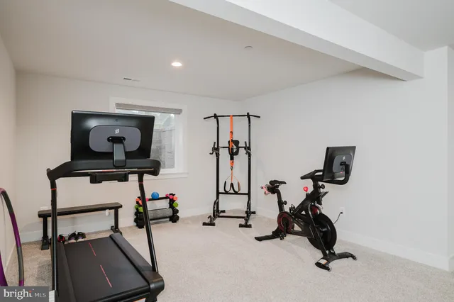 a view of a chairs and tables in the backyard