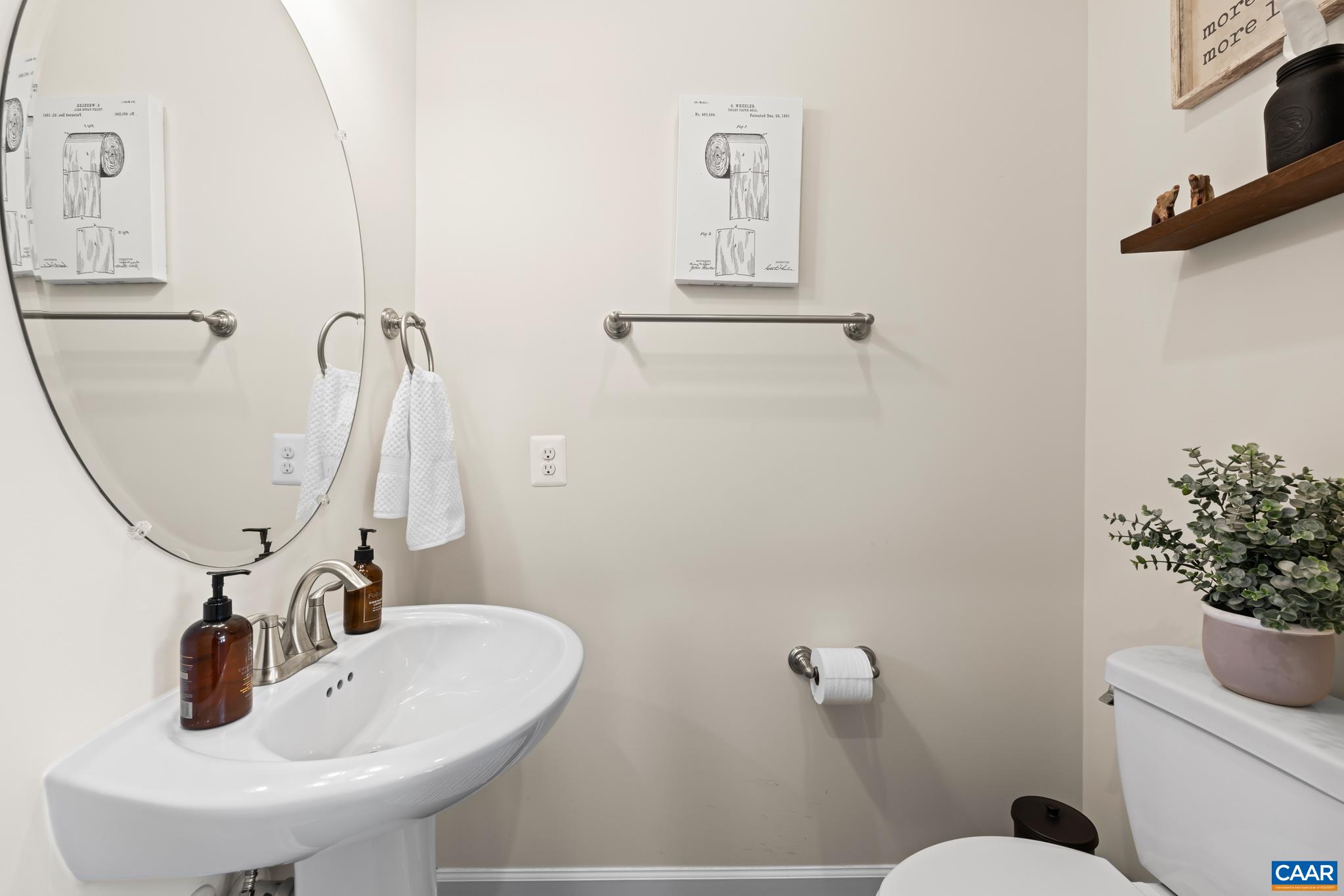 3490 Thicket Run Place Charlottesville, VA 22911 - Photo 24 of 63 a bathroom with a sink and mirror with toilet