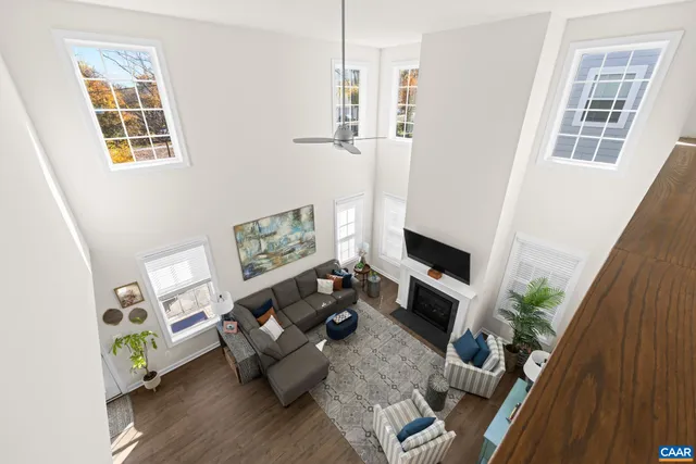 a bedroom with a large bed and a couch