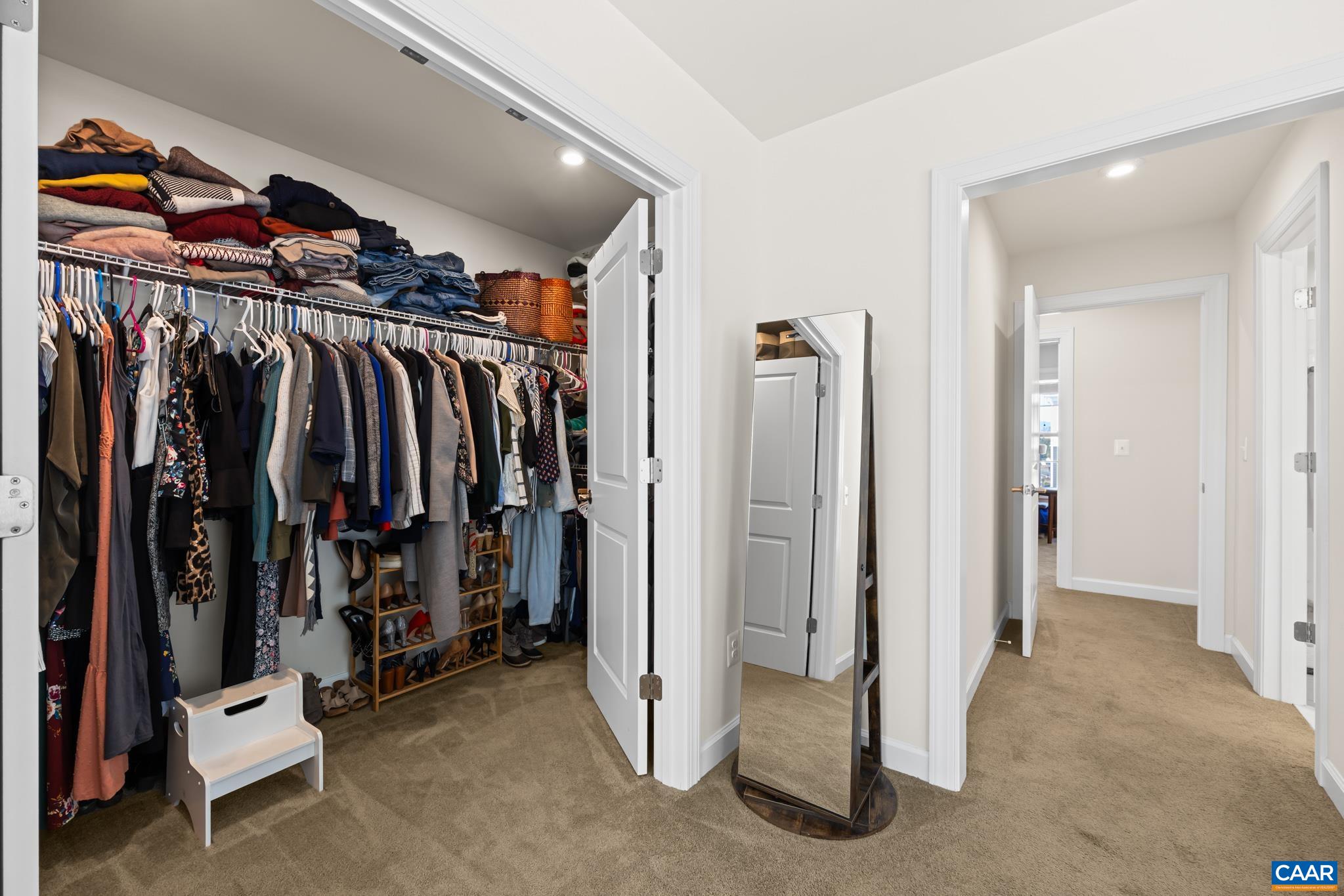 3490 Thicket Run Place Charlottesville, VA 22911 - Photo 29 of 63 a view of walk in closet with clothes