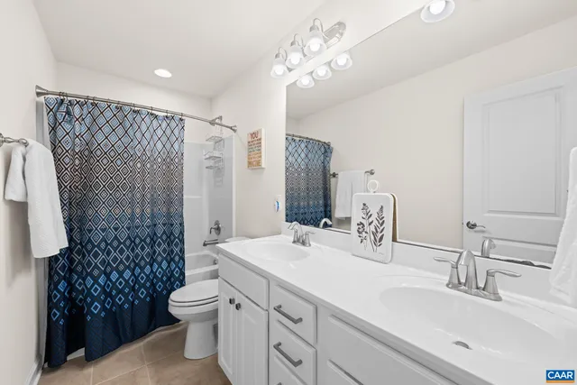 a view of a balcony dining table and chairs