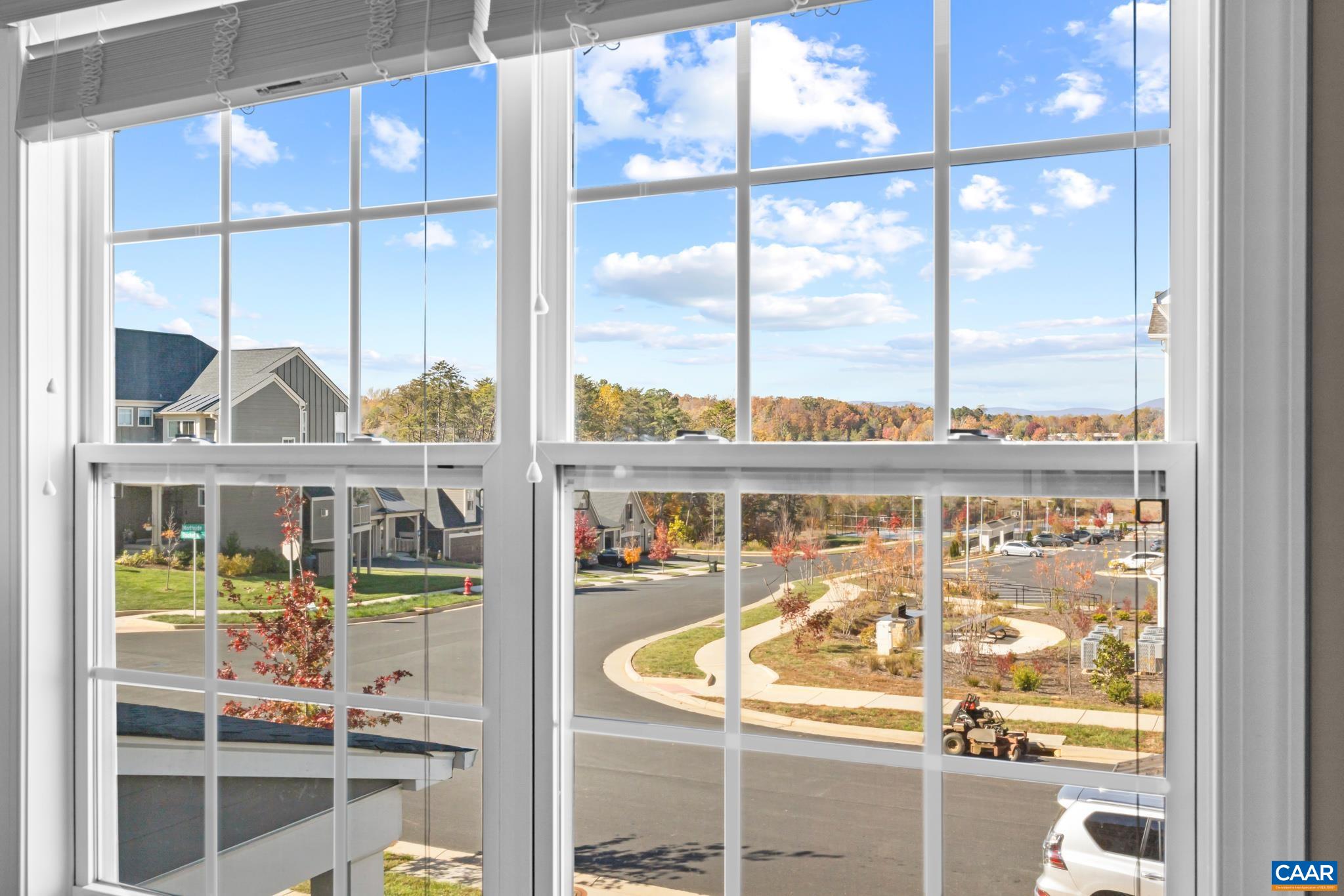 3490 Thicket Run Place Charlottesville, VA 22911 - Photo 35 of 63 a view of a balcony dining table and chairs