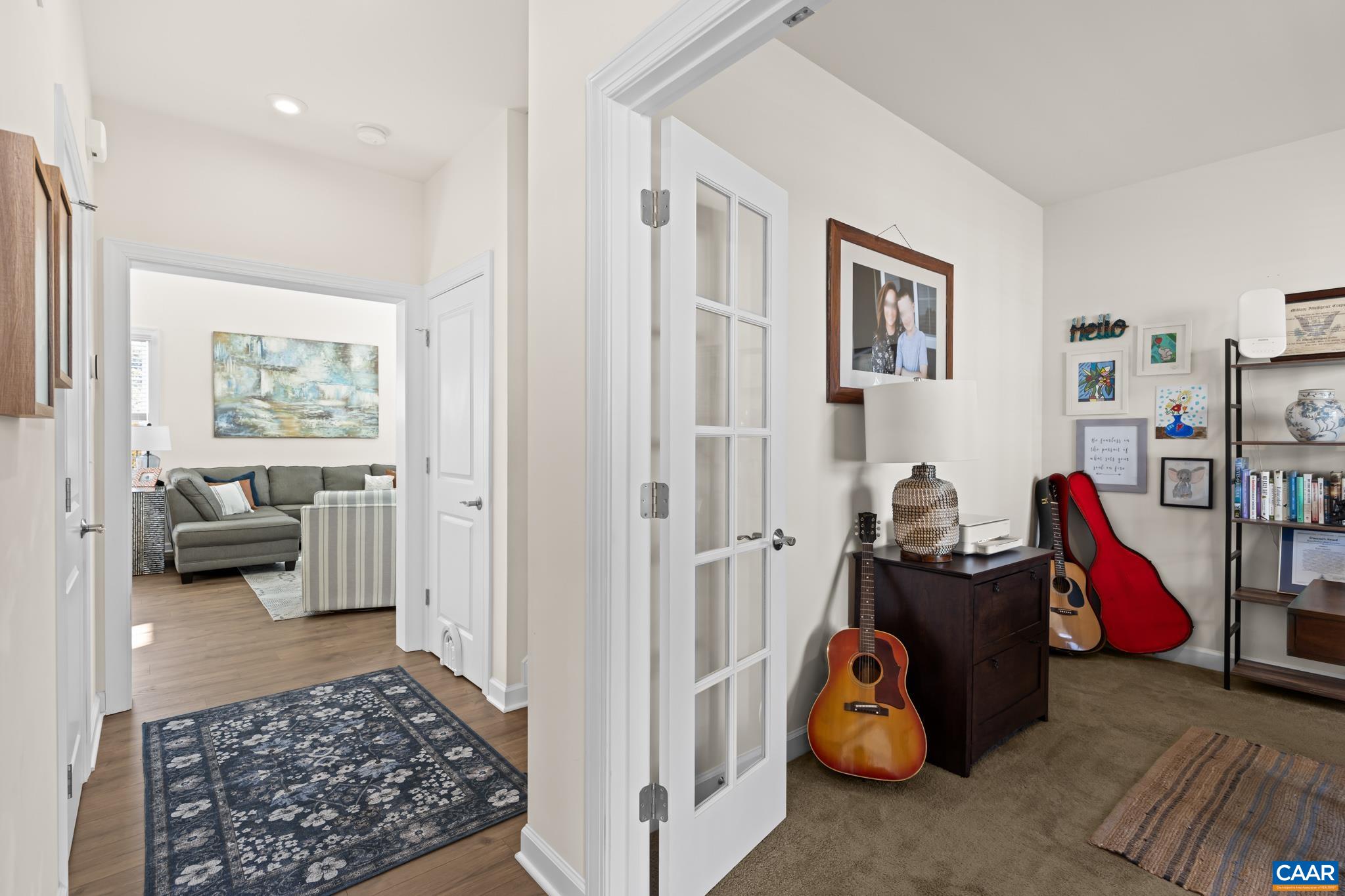 3490 Thicket Run Place Charlottesville, VA 22911 - Photo 9 of 63 a living room with furniture and a rug