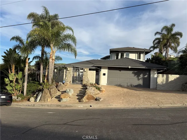 a front view of a house with balcony