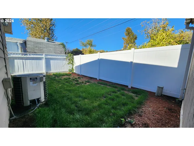 a black and white photo of a house