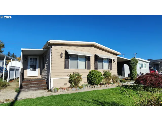 a black and white photo of a house