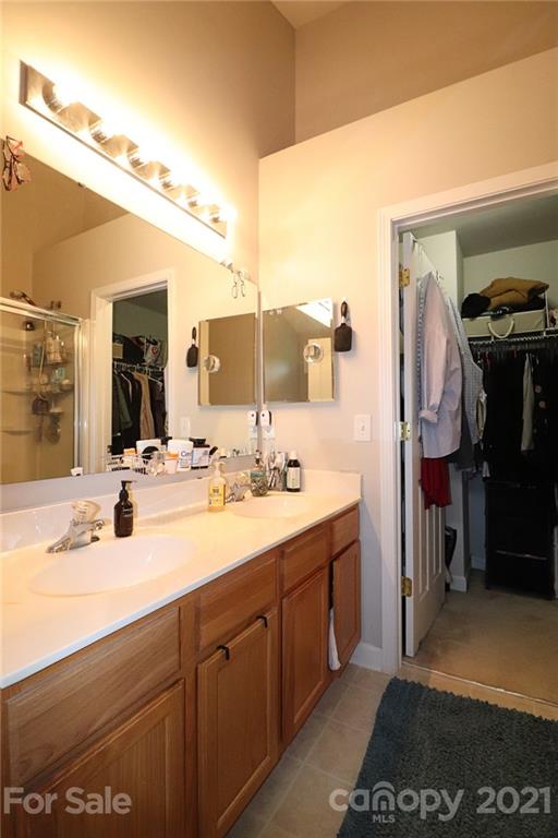 1139 Market Street Fort Mill, SC 29708 - Photo 13 of 17 a bathroom with a sink and a mirror