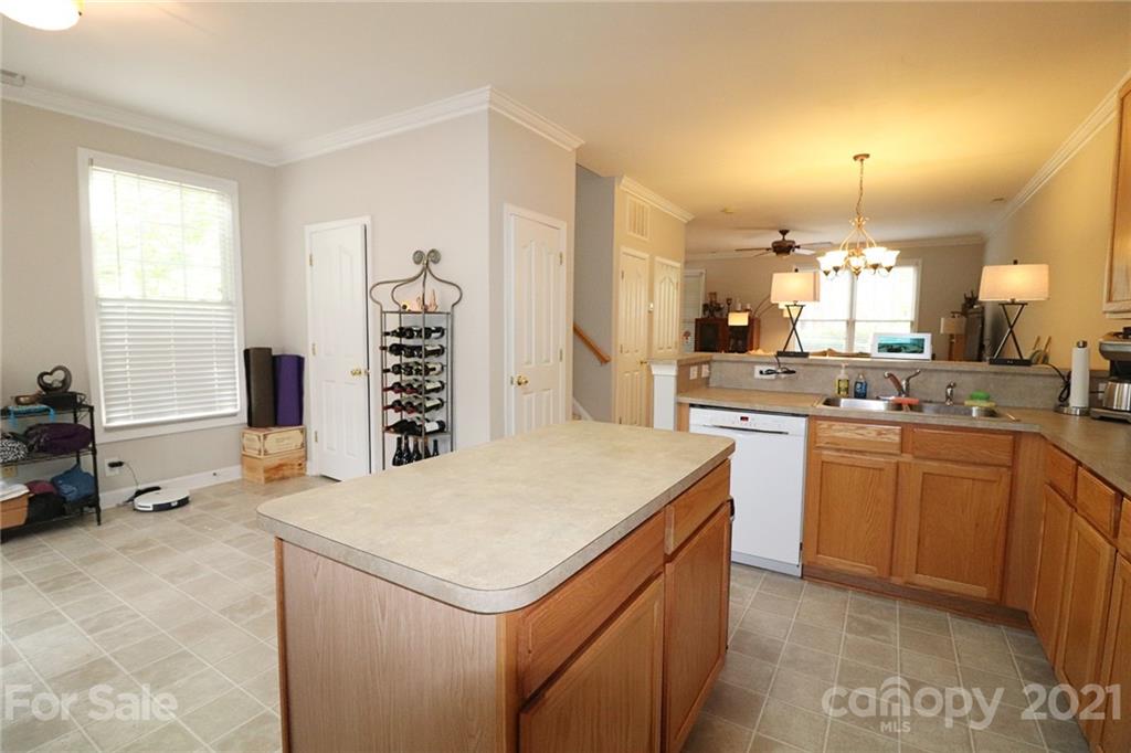 1139 Market Street Fort Mill, SC 29708 - Photo 8 of 17 a kitchen that has a lot of cabinets in it and a window