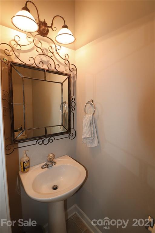 1139 Market Street Fort Mill, SC 29708 - Photo 10 of 17 a bathroom with a sink and mirror