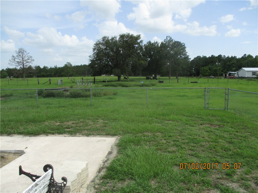 28296 Trigg Road Hilliard, FL 32046 - Photo 27 of 34 a view of a golf course with a park