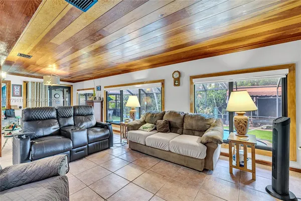 a kitchen with stainless steel appliances granite countertop a sink and a counter top space