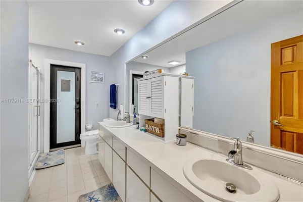 a view of a backyard with furniture and tub