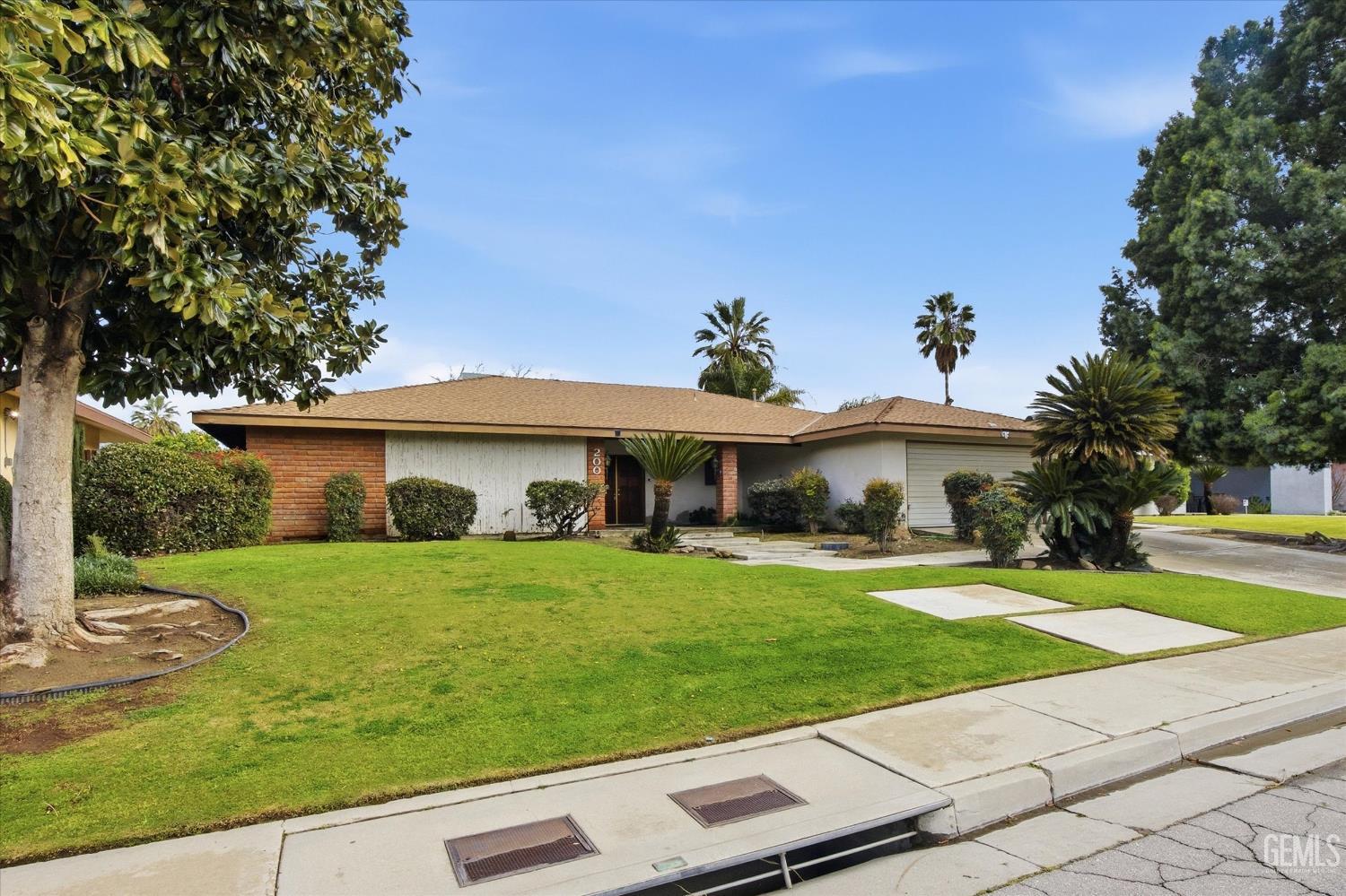 Undisclosed Address Bakersfield, CA 93309 - Photo 13 of 41 a view of a yard in front of house