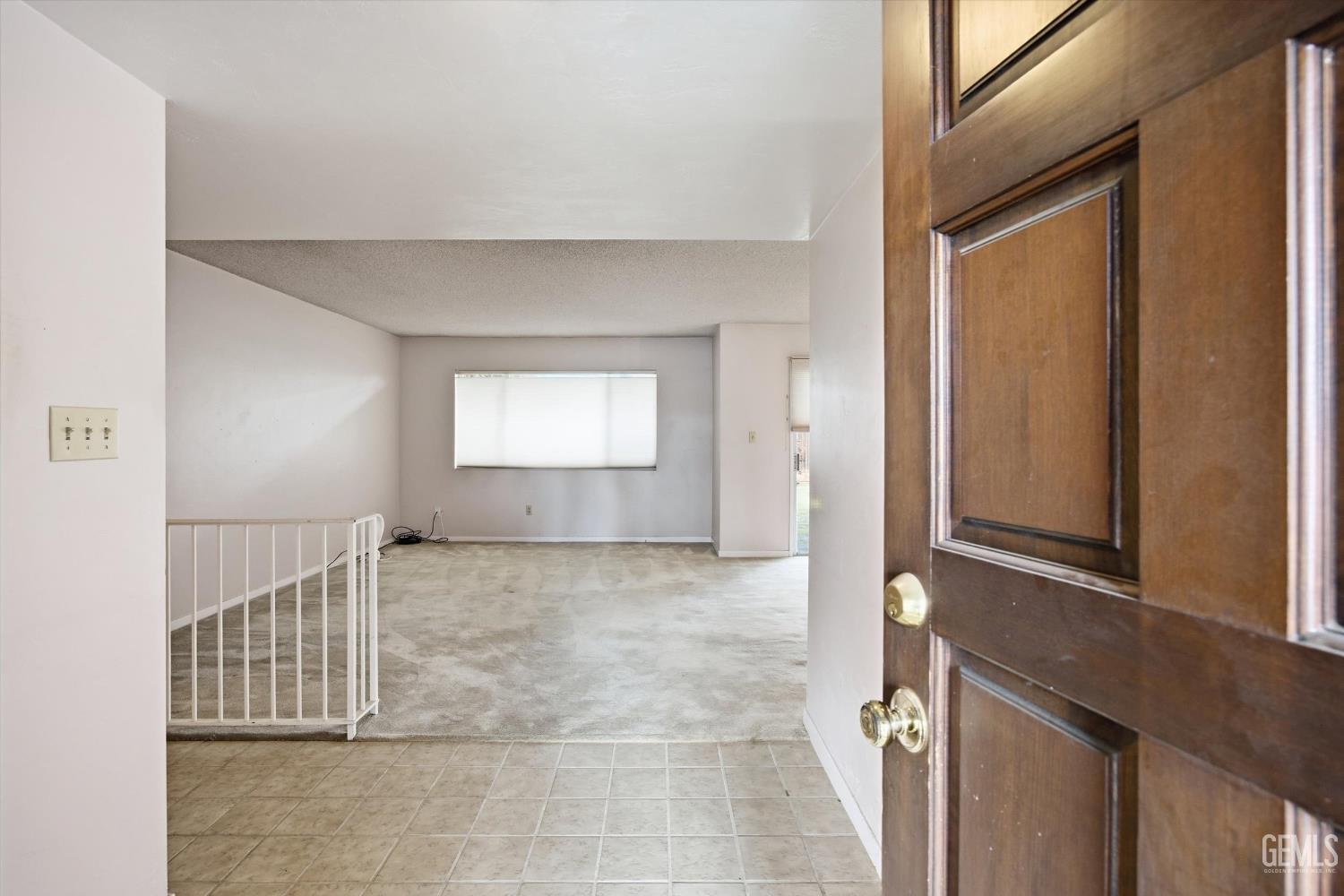 Undisclosed Address Bakersfield, CA 93309 - Photo 17 of 41 a view of an empty room with a window