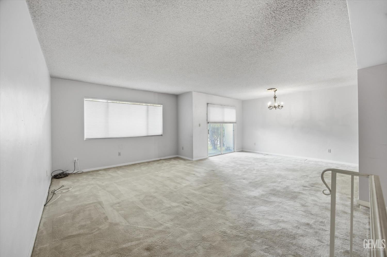 Undisclosed Address Bakersfield, CA 93309 - Photo 20 of 41 a view of an empty room with a window