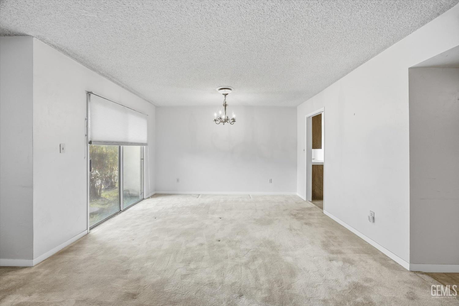 Undisclosed Address Bakersfield, CA 93309 - Photo 23 of 41 a view of an empty room with a window