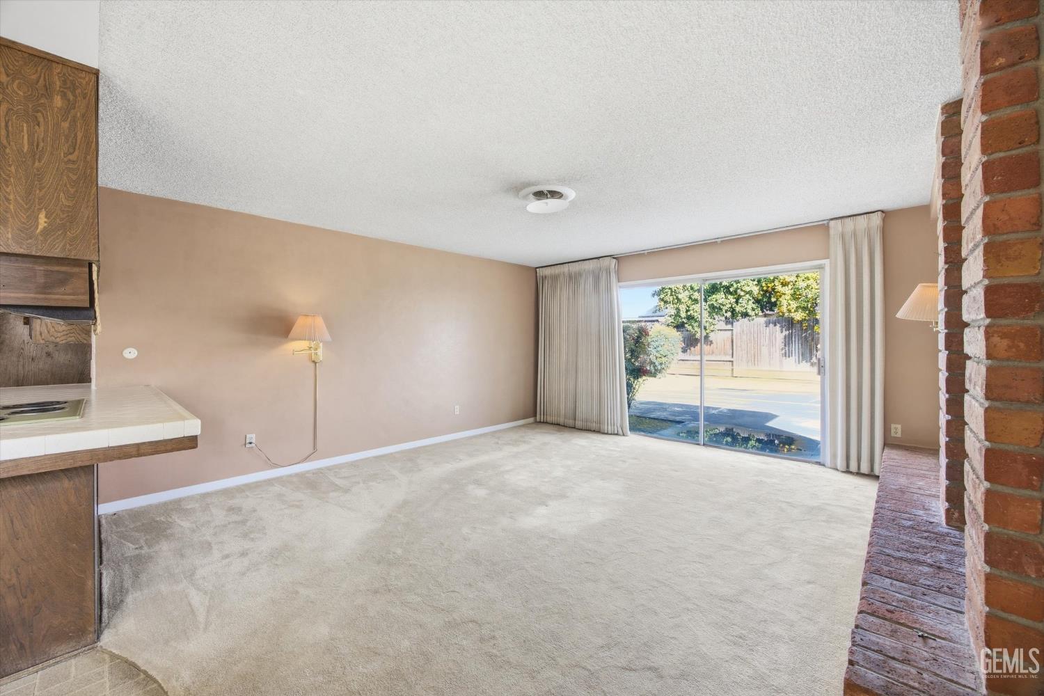 Undisclosed Address Bakersfield, CA 93309 - Photo 25 of 41 a view of an empty room with a window