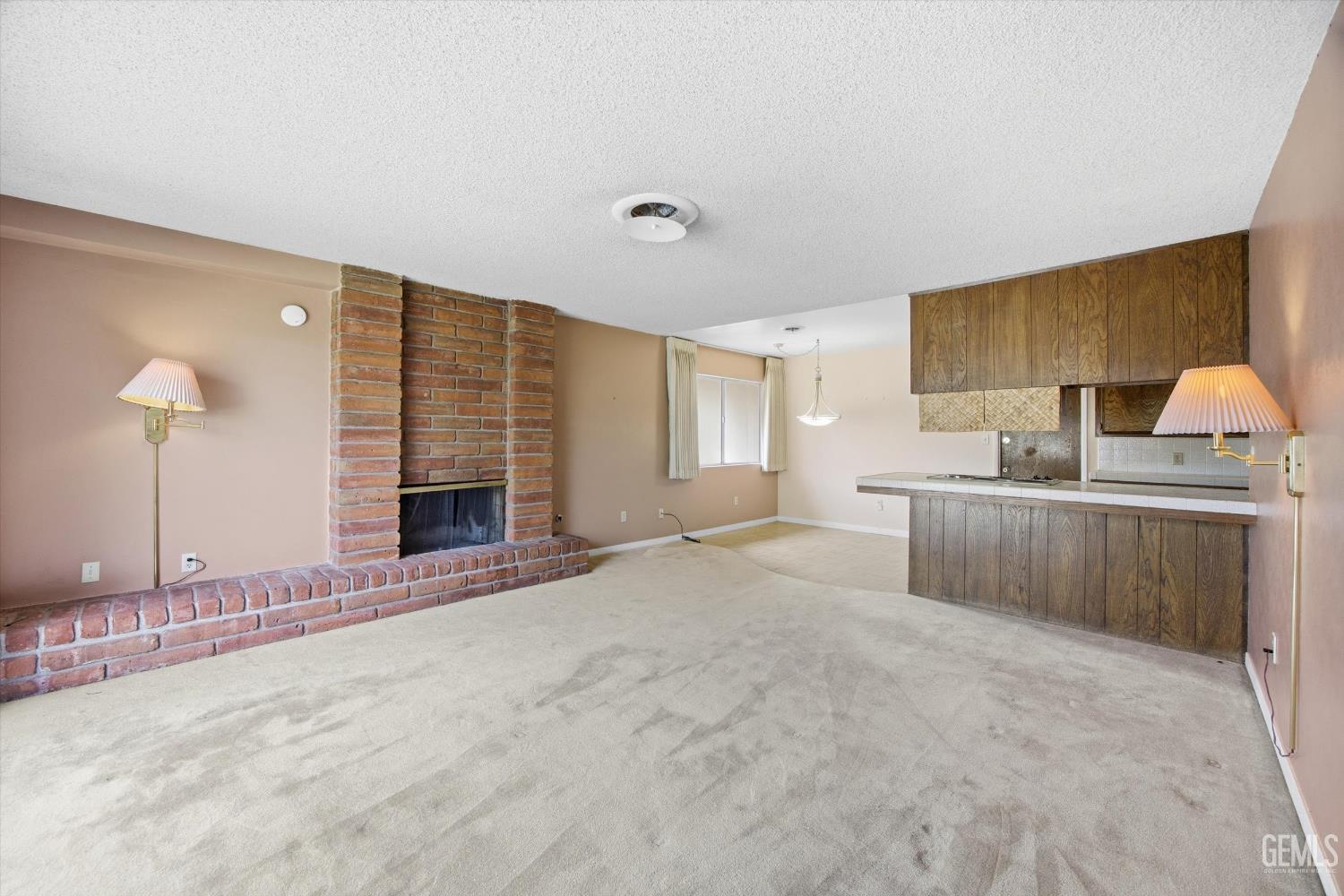 Undisclosed Address Bakersfield, CA 93309 - Photo 27 of 41 a view of a kitchen with a sink and a window