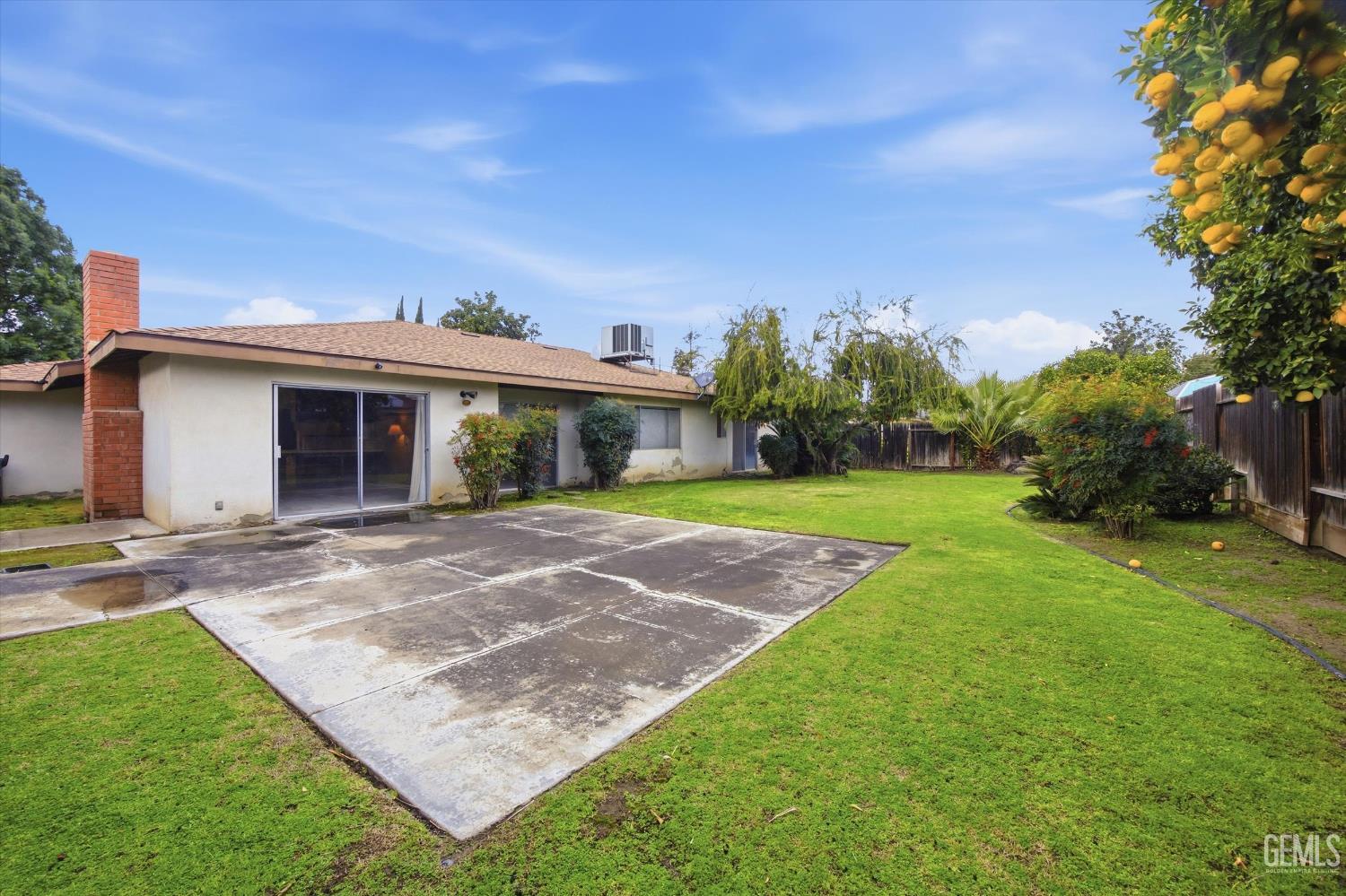 Undisclosed Address Bakersfield, CA 93309 - Photo 4 of 41 a view of a house with a yard
