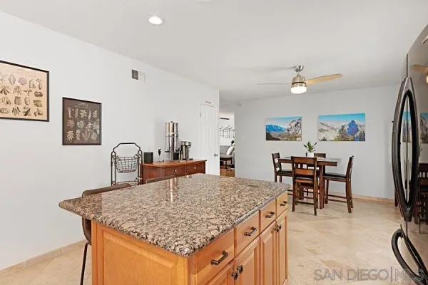 a view of a kitchen tables and chair
