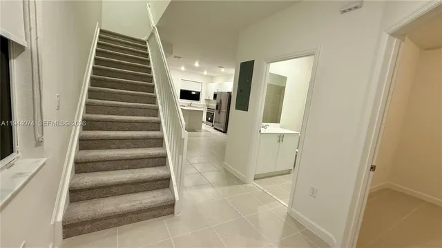 a view of a livingroom with a flat screen tv
