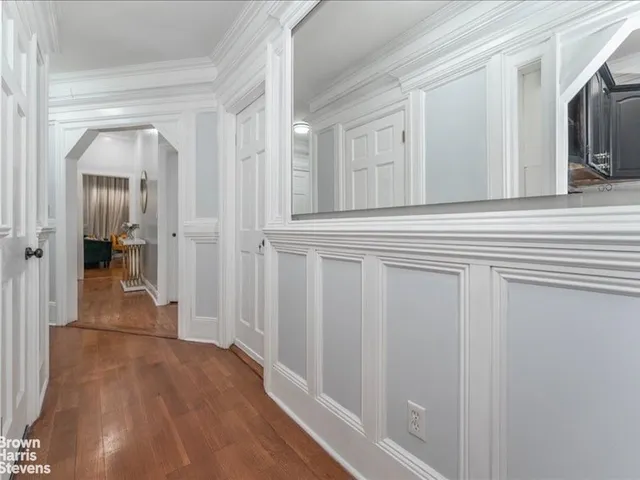 a view of a livingroom from a hallway