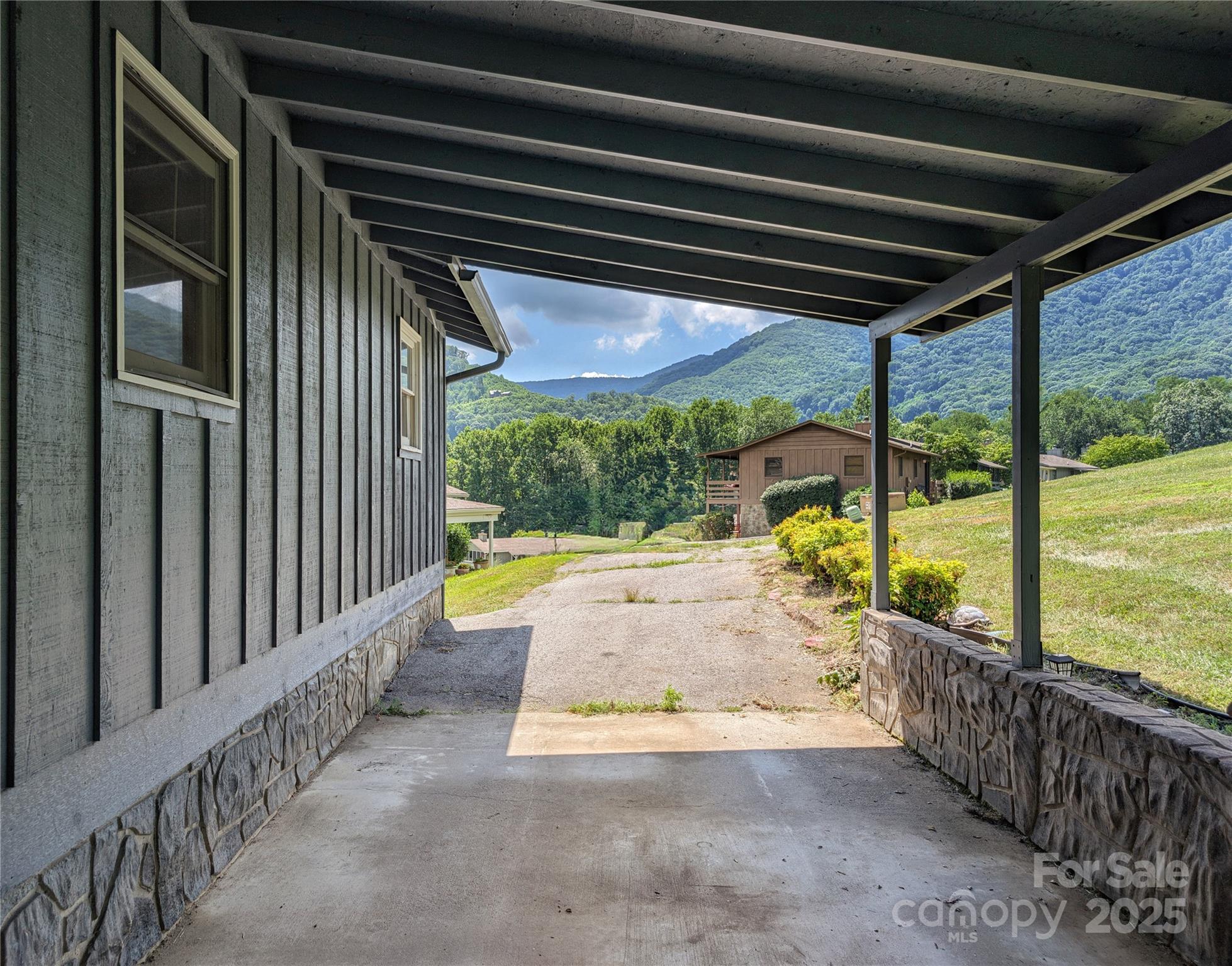84 Stoney Ridge Loop Maggie Valley, NC 28751 - Photo 10 of 27 a view of swimming pool with a porch