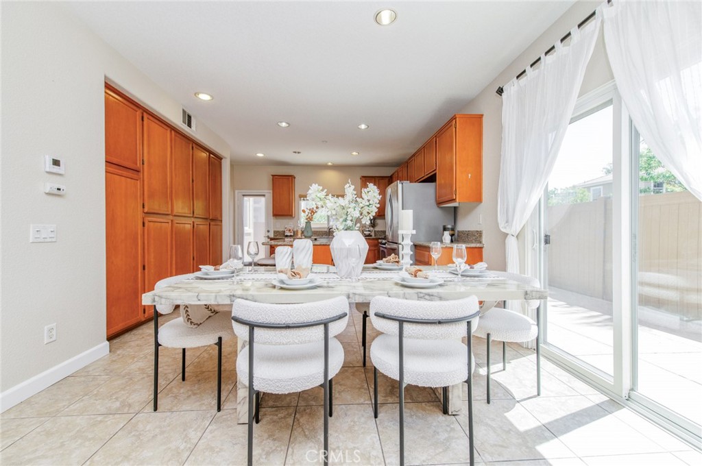 4947 Plumtree Court Riverside, CA 92504 - Photo 16 of 46 Spacious dining & a breakfast bar for casual dining and social gatherings