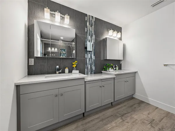 a bedroom with a bed and a table