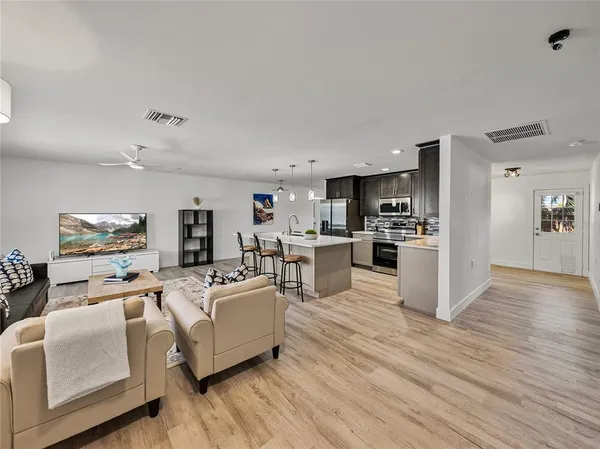 a living room with furniture and a table