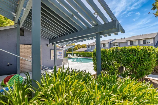 a view of swimming pool with patio
