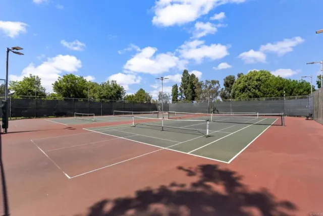 a view of a backyard with sitting area