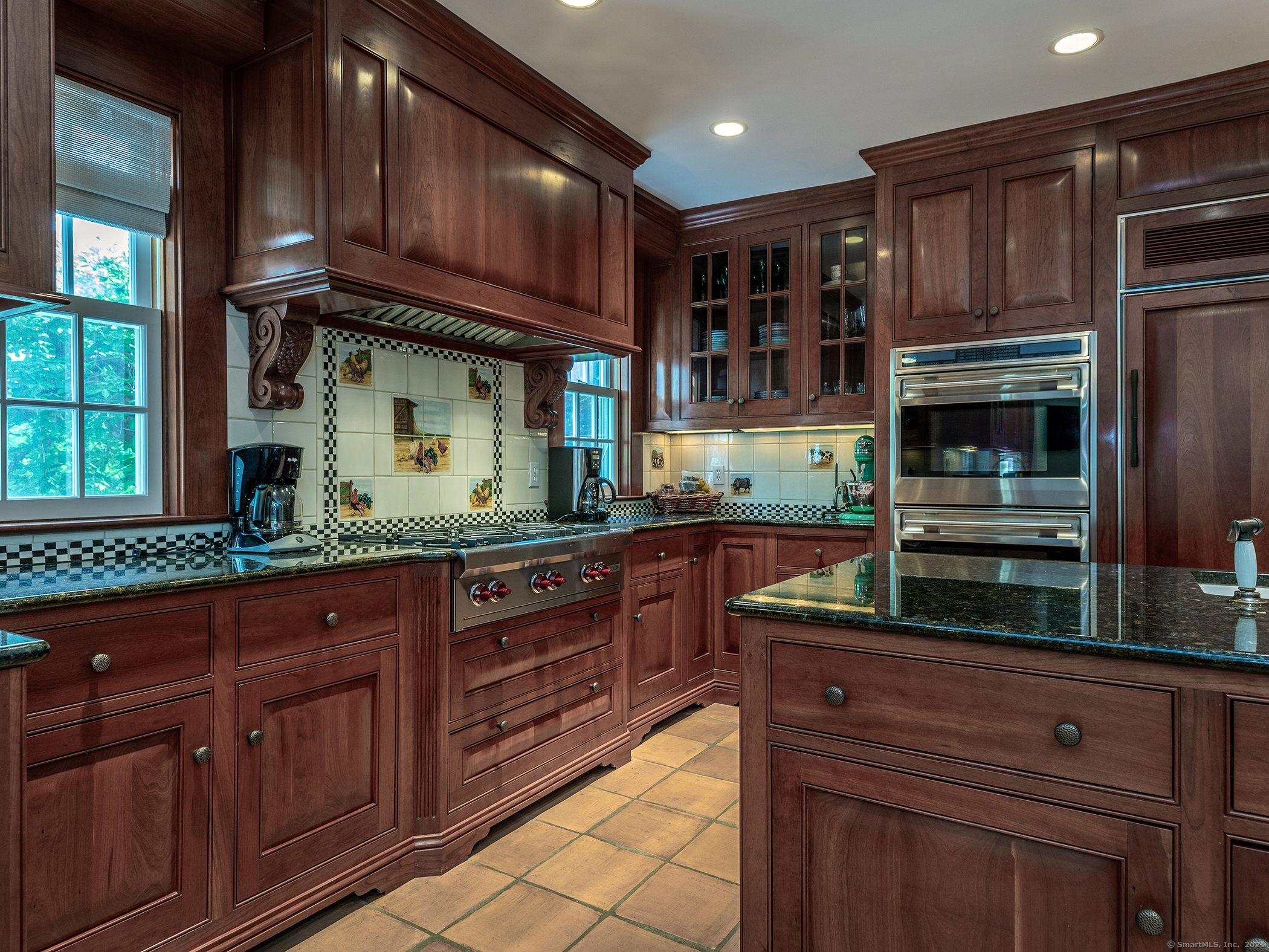 88 Rucum Road Roxbury, CT 06783 - Photo 16 of 35 a kitchen with granite countertop wooden cabinets stainless steel appliances and a counter space