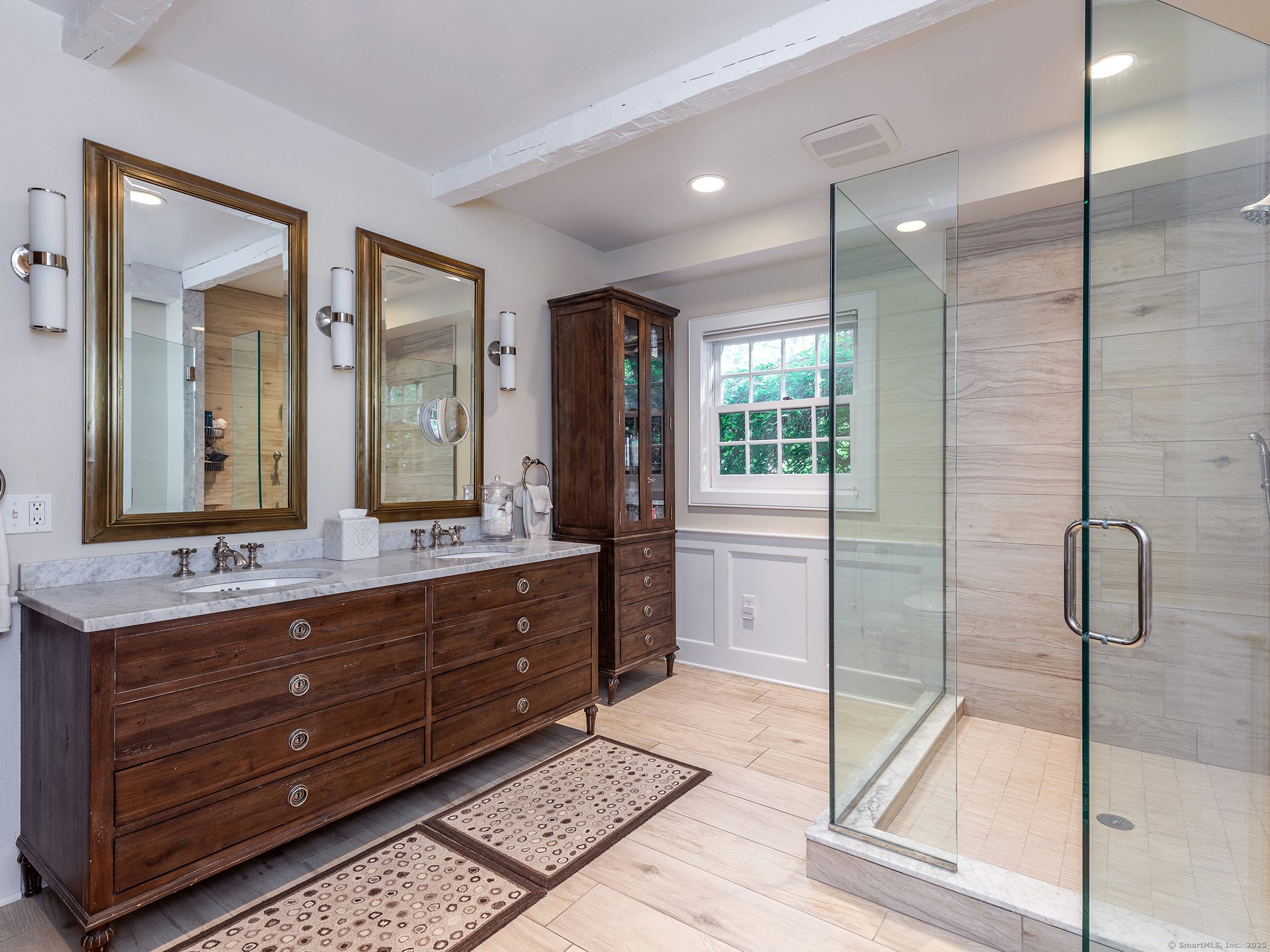 88 Rucum Road Roxbury, CT 06783 - Photo 24 of 35 a bathroom with a double vanity sink toilet and shower