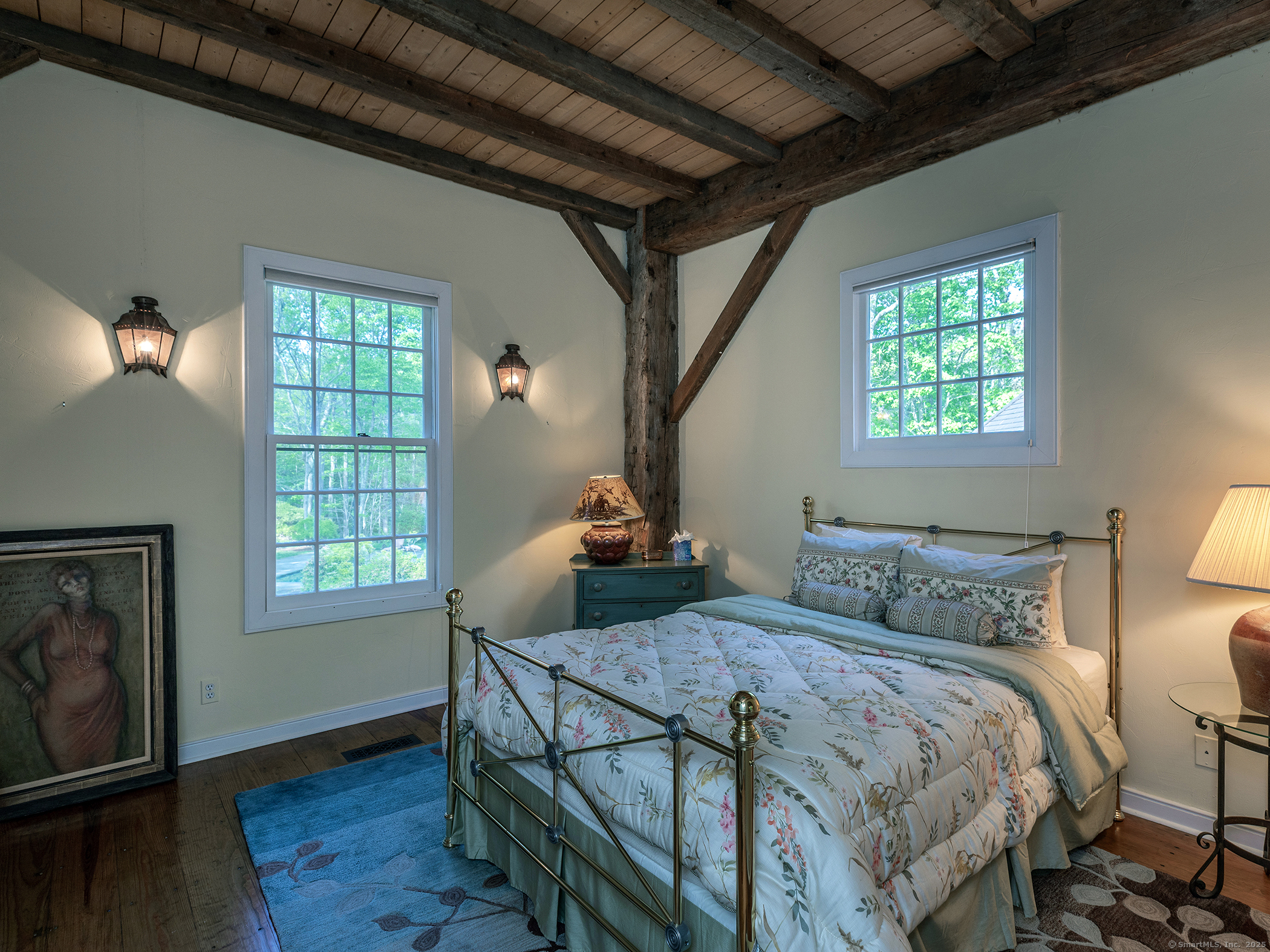 88 Rucum Road Roxbury, CT 06783 - Photo 30 of 35 a bedroom with a bed a dresser with wooden floor