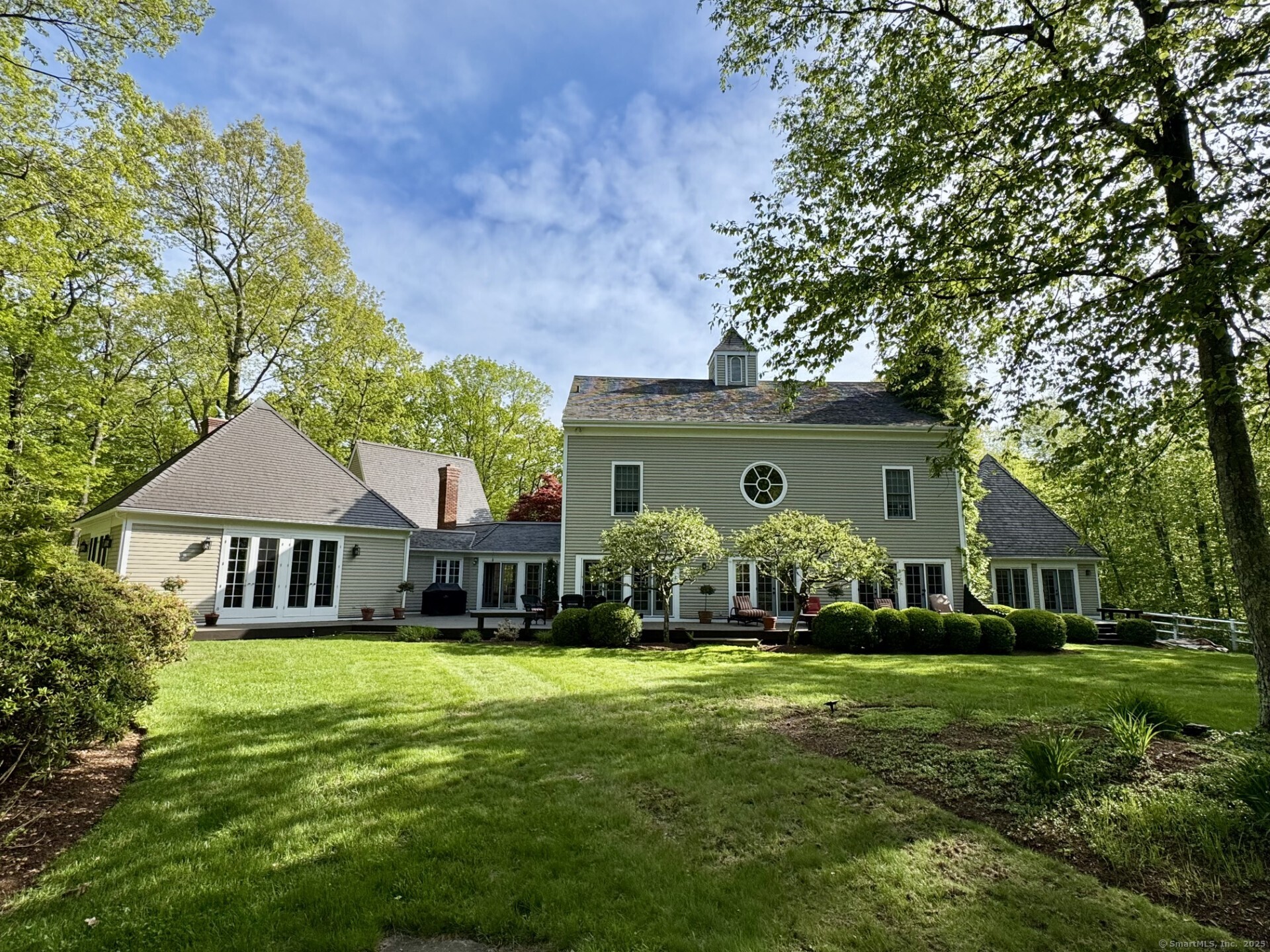88 Rucum Road Roxbury, CT 06783 - Photo 3 of 35 a front view of a house with a garden