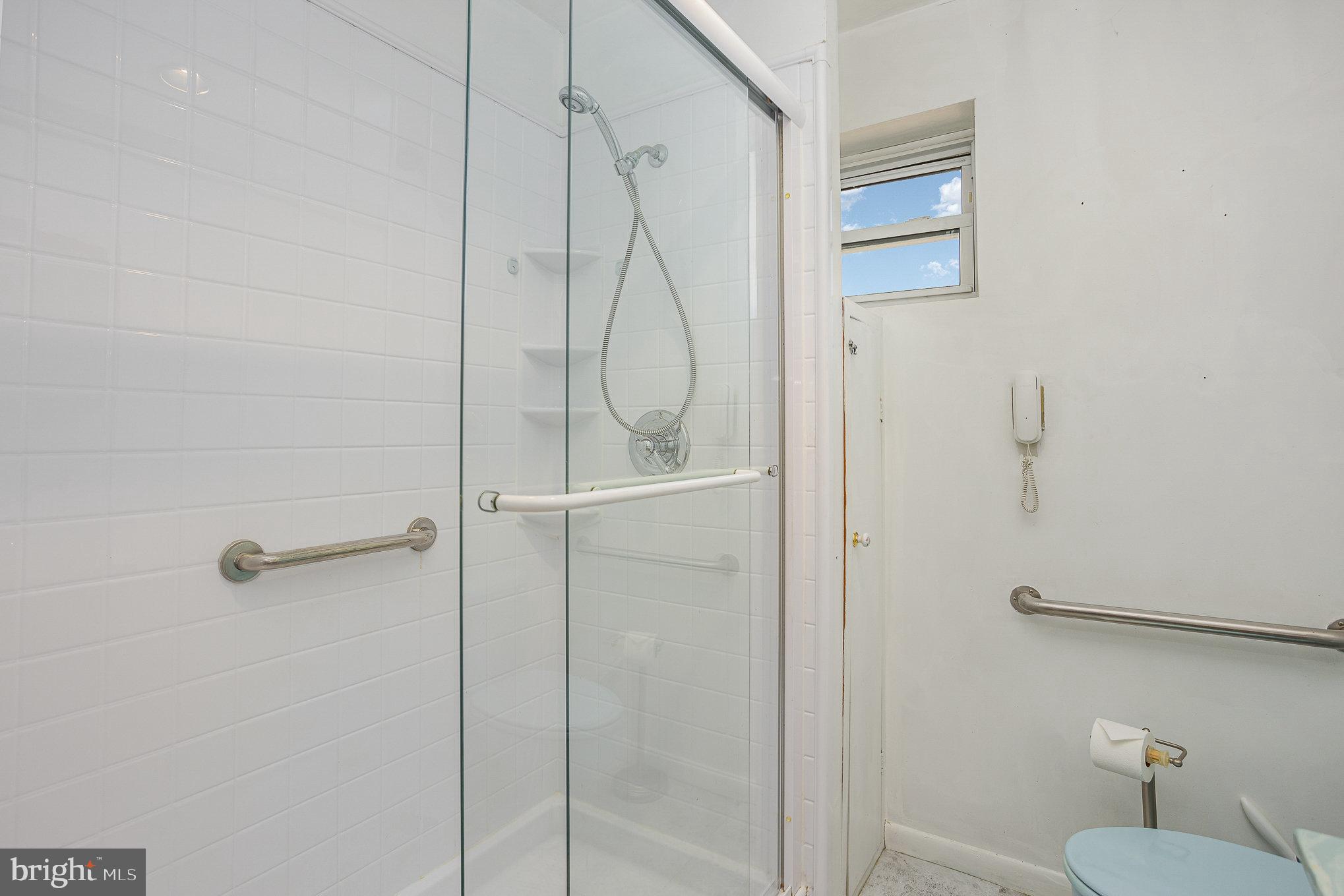 1408 Locust Street Curtis Bay, MD 21226 - Photo 16 of 25 a bathroom with a shower