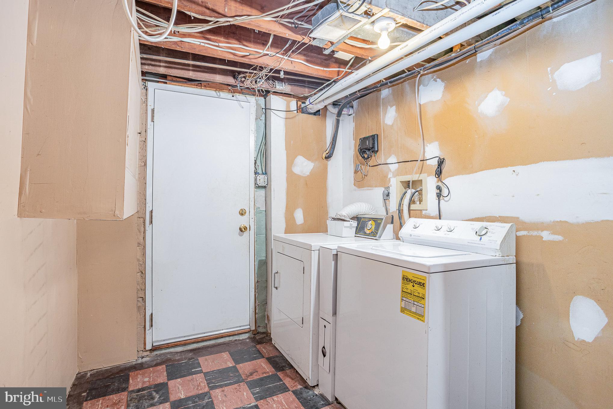 1408 Locust Street Curtis Bay, MD 21226 - Photo 21 of 25 a utility room with dryer and washer