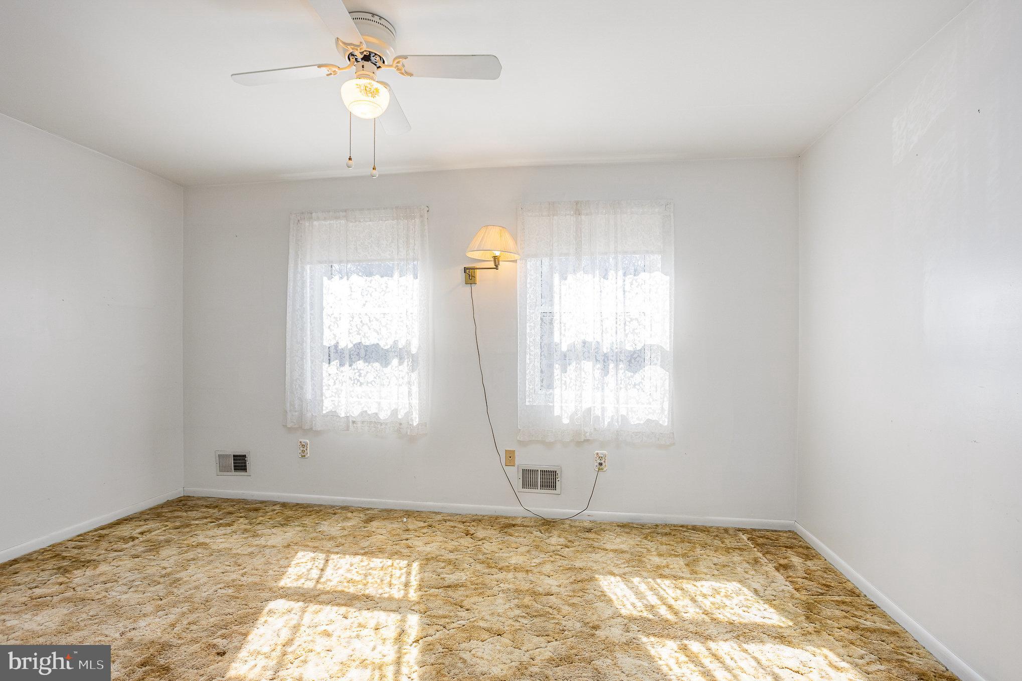 1408 Locust Street Curtis Bay, MD 21226 - Photo 8 of 25 a view of an empty room and window