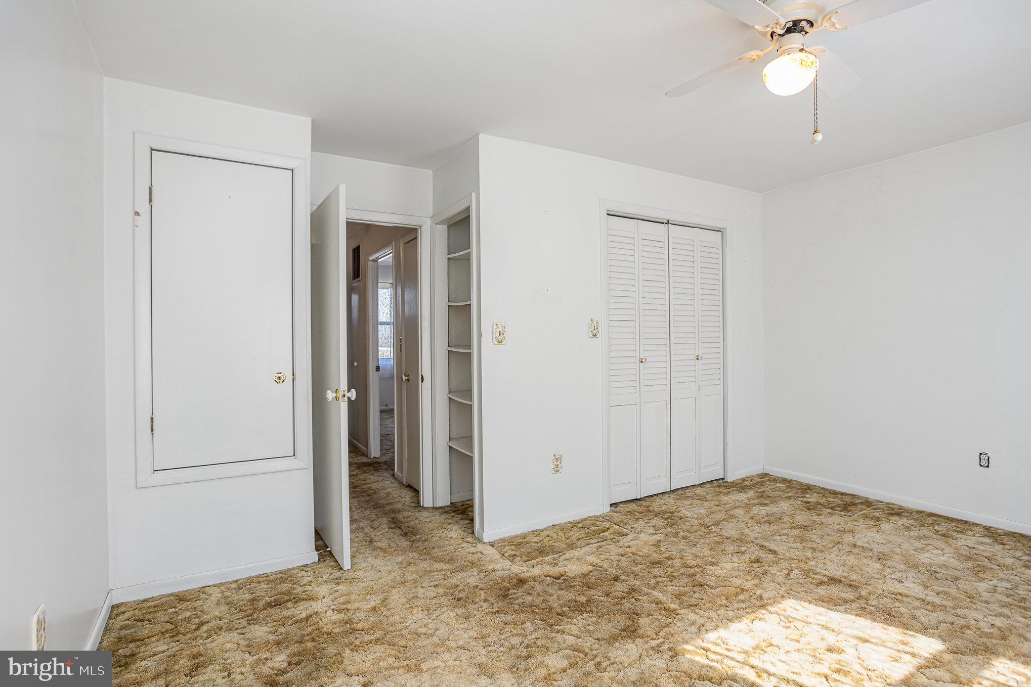 1408 Locust Street Curtis Bay, MD 21226 - Photo 9 of 25 a view of a bedroom with closet and bedroom