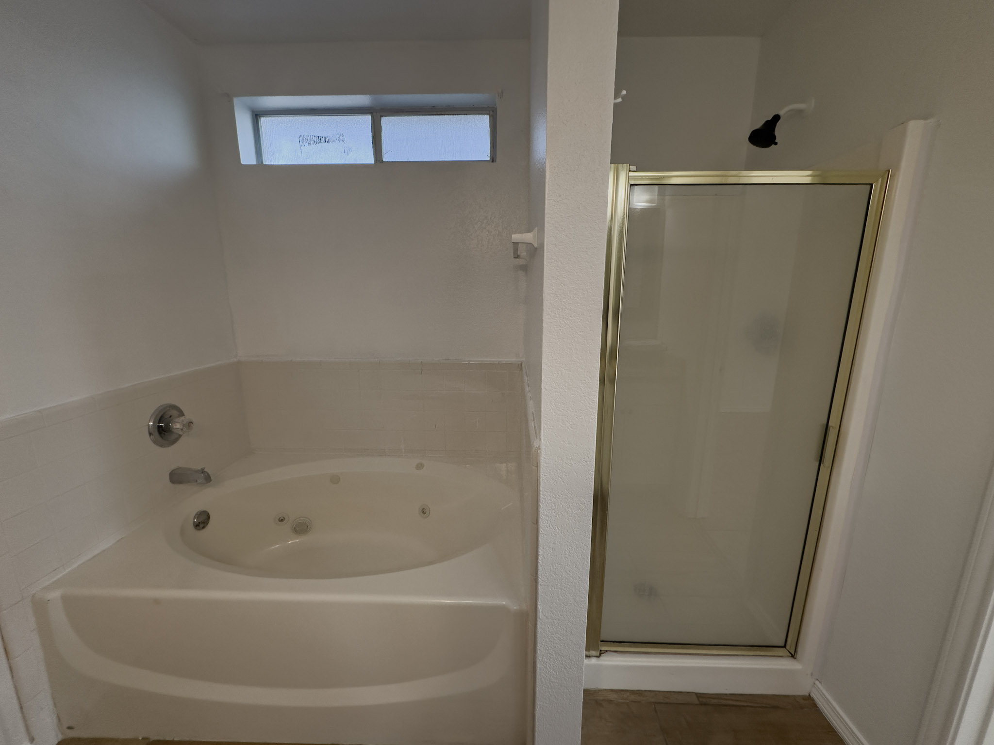 3806 Fieldcrest Drive Killeen, TX 76549 - Photo 21 of 33 a bathroom with a bathtub and a shower