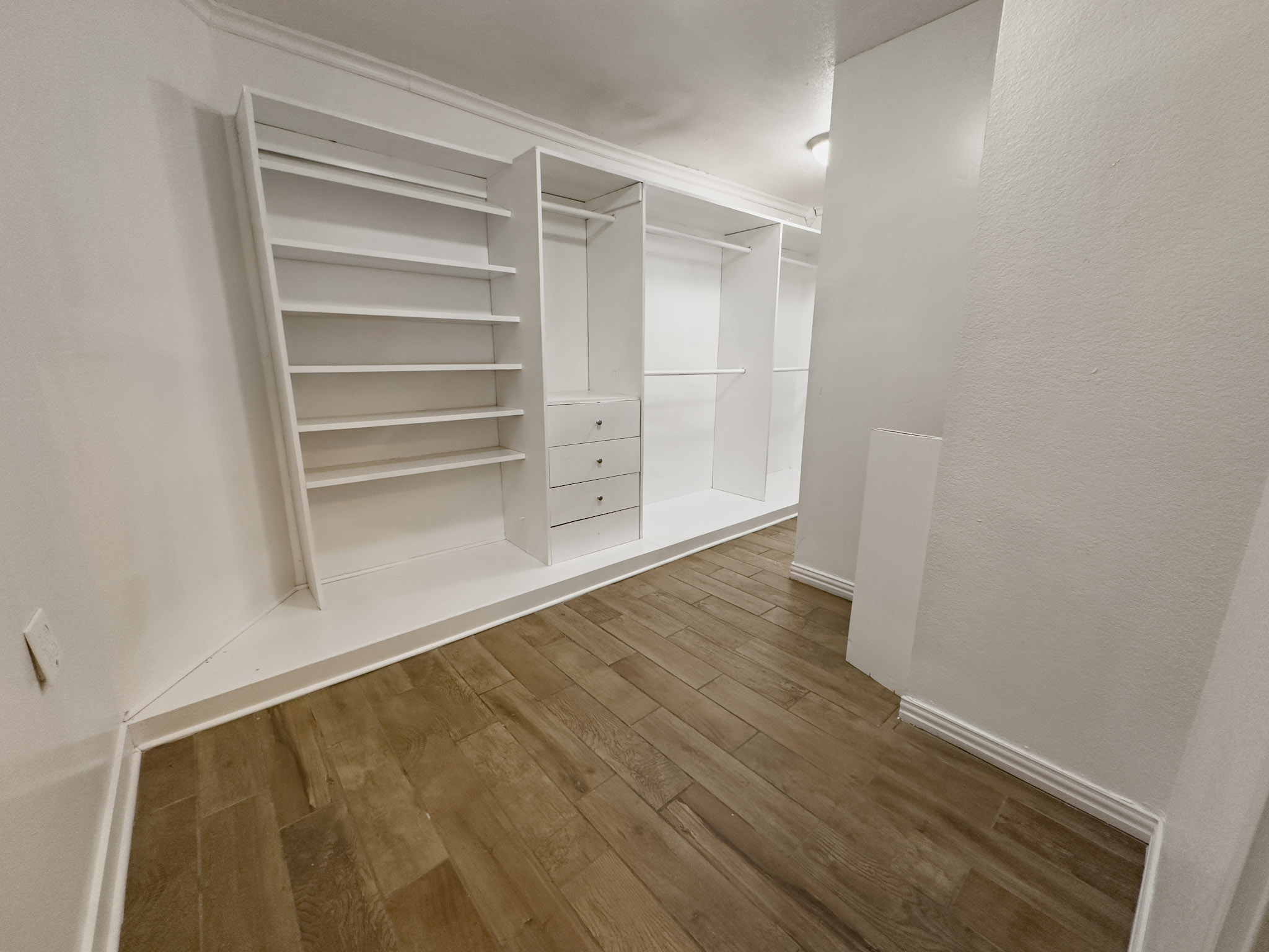 3806 Fieldcrest Drive Killeen, TX 76549 - Photo 25 of 33 a view of an empty room with wooden floor and a window