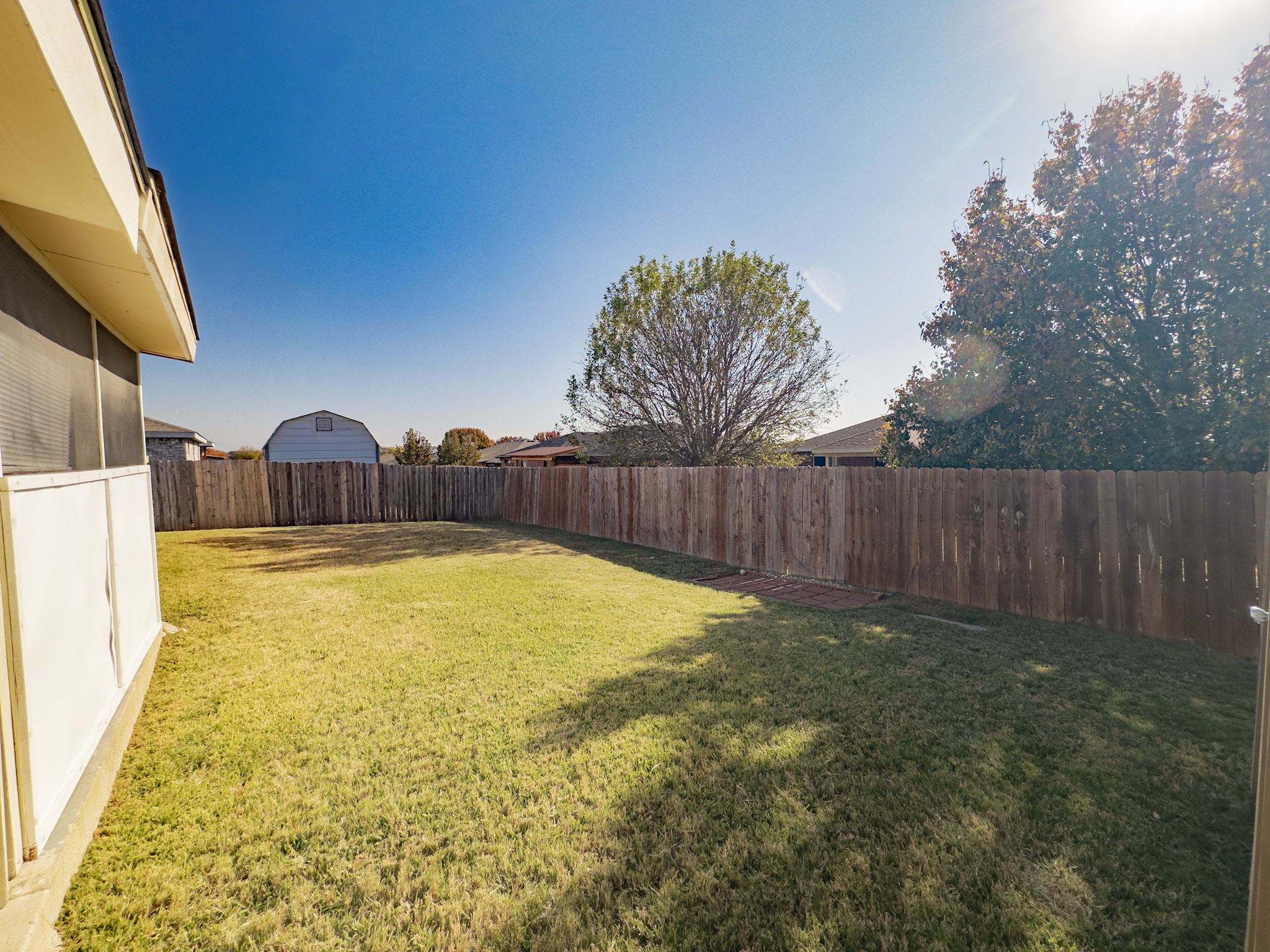 3806 Fieldcrest Drive Killeen, TX 76549 - Photo 28 of 33 a view of a swimming pool with a yard and wooden fence